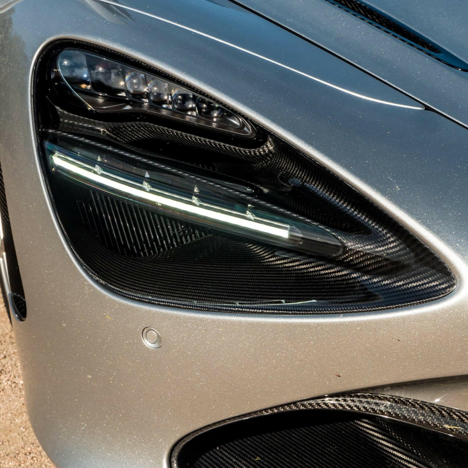 Carbon Fiber Headlight Trim Replacement - McLaren 720s.